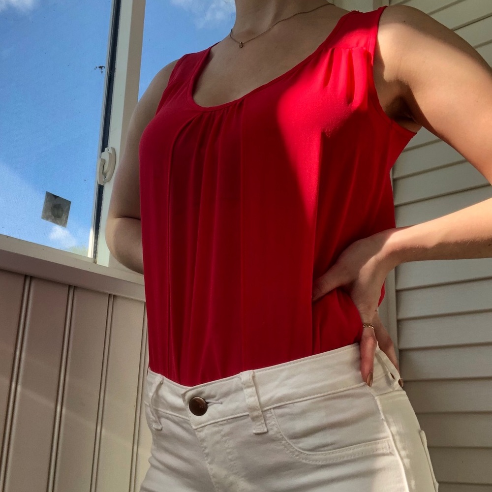 Bright red sheer top